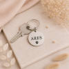Llavero mascota personalizado con nombre grabado y huella en acero inoxidable