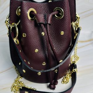 BOMBONERA PIEL TACHUELAS